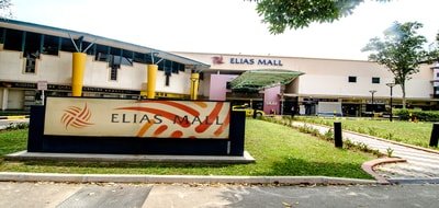 Elias Mall exterior and lawn along Elias Road in Pasir Ris, the neighbourhood shopping centre that houses Double You Hair Salon