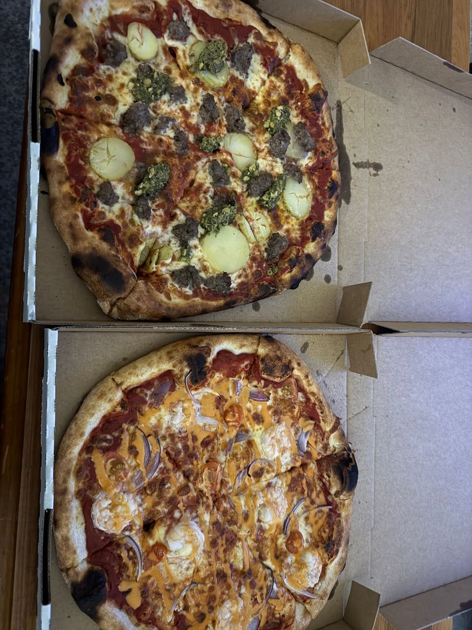 Two takeaway pizzas in cardboard boxes from NY Sourdough Pizza in North Hobart