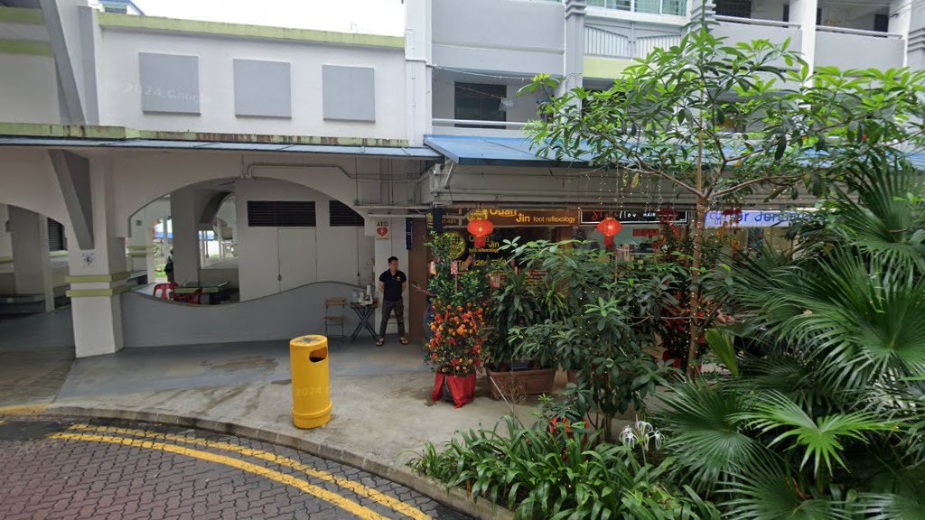 Sheltered walkway along Block 123 Lorong 1 Toa Payoh showing the Style Now Hair Salon shopfront